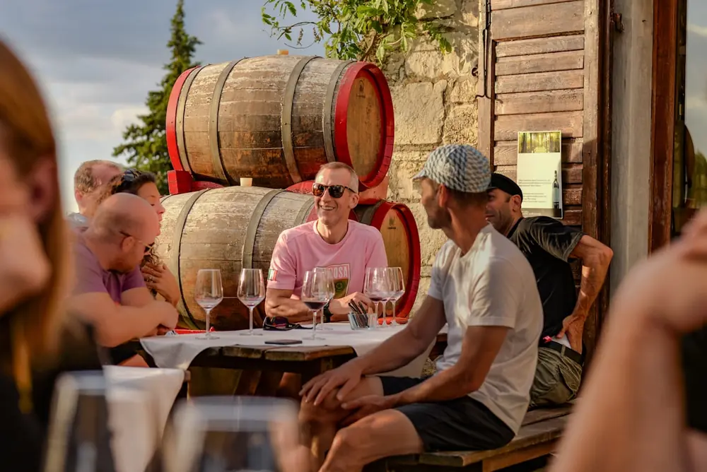 Friends enjoying wine tasting at a winery in Adelaide wine region